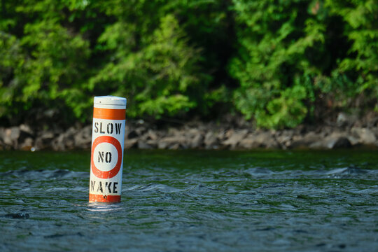 Floating buoy warns boats to go slow, with no wake