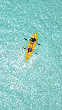 People kayaking in the sea