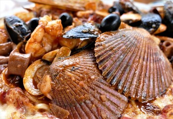 Fresh musses dish in delicious sauce and olives