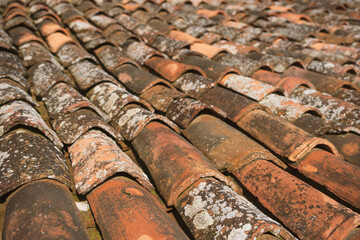 Old and worn roof tile.