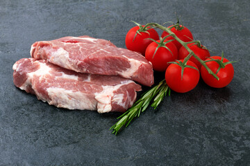 Meat on black surface
