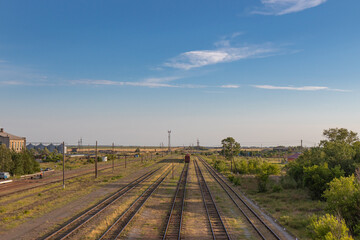 Fototapeta na wymiar Railway tracks going beyond the horizon