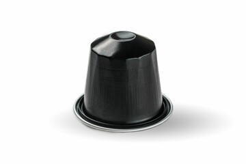 Black coffee capsule for machine against a white background
