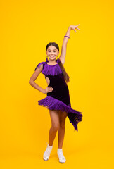 Beauty teenager female dancer is dancing wearing dress. Girl dancing sports ballroom.