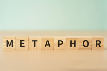 隠喩・比喩のイメージ｜「METAPHOR」と書かれたブロック
