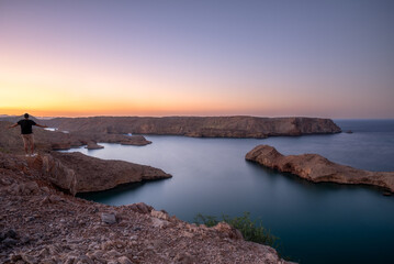 Fototapeta na wymiar Bandar Al Khayran, Muscat, Oman sunset over the sea