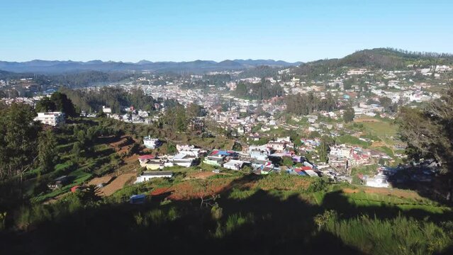 Aerial view of modern buildings in the forest in Ooty, India