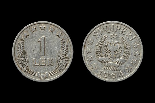 Closeup shot of Albanian lek coin from both obverse and reverse sides on a black background