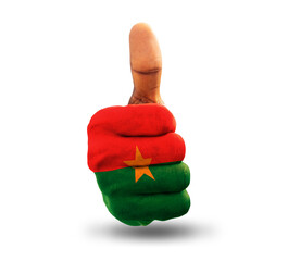 Thumbs up painted in Burkinabe flag colors isolated on white background. National flag of Burkina...