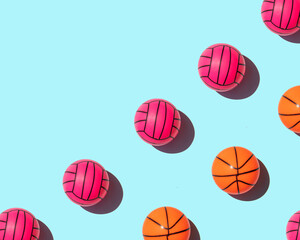 Creative sport concept. Colorful balls on pastel bright purple background. Minimalistic education composition with copy space.
