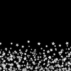 glitter silver metallic stars confetti scatter bottom border frame on a black background