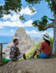couple hiking in the mountains of Saint Lucia Caribbean, nature trail in the jungle of Saint Lucia...