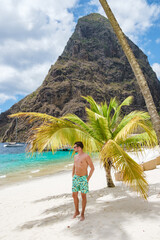young men in a swim short on vacation in Saint Lucia, luxury holiday Saint Lucia Caribbean, men on...