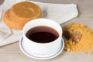 agua de panela, cubes and granulated or sugar cane candy typical food from Colombia