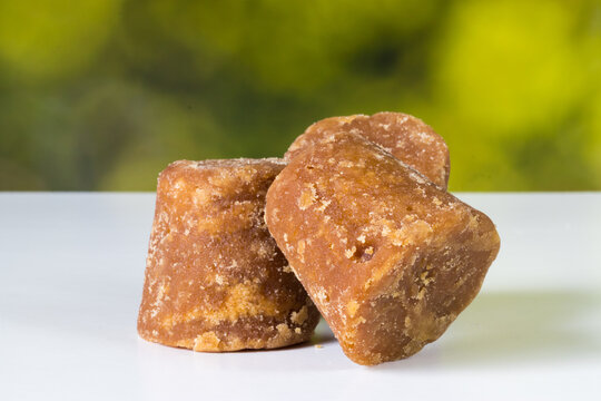 panela cubes or sugar cane candy on a nature background with copy space, typical food from Colombia