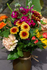 Close up texture background of fresh colorful flowers in an indoor florist arrangement