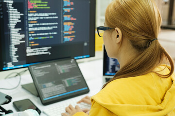 Close up programmer is coding and programming software.