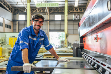 Portrait of Caucasian man industry worker working in factory warehouse