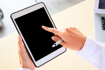 Empty blank screen tablet isolated with clipping path. Healthcare and wellness concept.