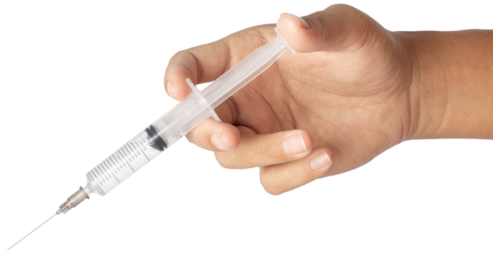 Syringe medical injection in hand.
