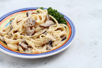 Freshly cooked fettuccine pasta in carbonara sauce