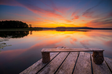 Beautiful summer sunrise over lake