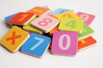 Number wood block cubes for learning Mathematic, education math concept.