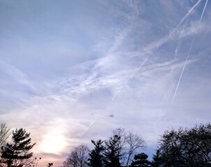Fototapeta na wymiar Bright Spring Evening Cloudscape With Streaking Clouds
