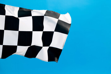 Checkered flag waving on blue background