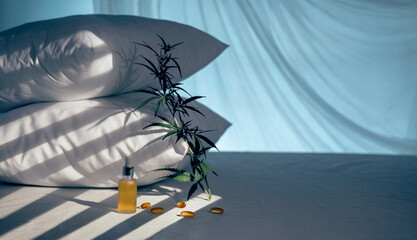 Evening bedroom with cbd oil, capsules and a cannabis branch. Melatonin production, a concept to...