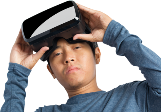 Young man using VR virtual reality headset.