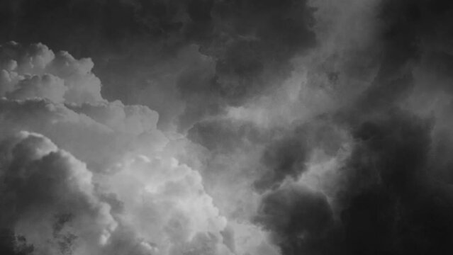 thunderstorms and dark cumulonimbus clouds with lightning strikes