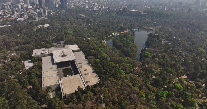 Mexico City Aerial v81 birds eye view flyover and around anthropology museum at chapultepec park capturing cityscape of prestigious polanco neighborhood - Shot with Mavic 3 Cine - January 2022