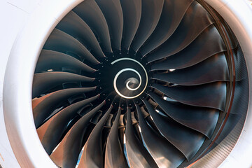 A close-up view of an aircraft jet engine turbine