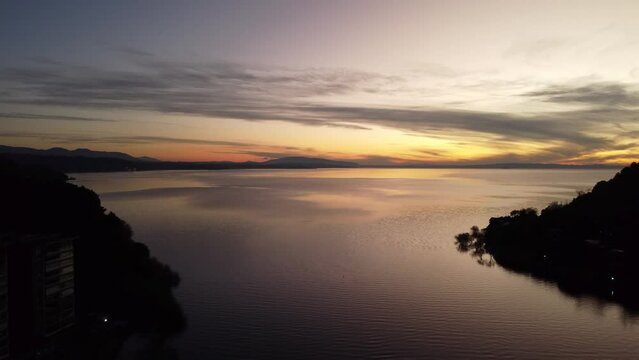 sunset over the lake in pucon chile