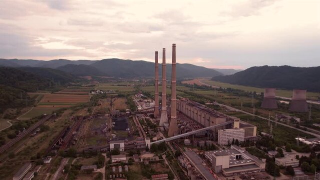 Aerial view of disaffected coal power plant, at sunset
