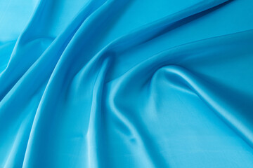 Close up of light blue silk background