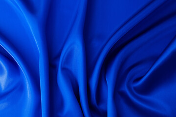 Close up of dark blue silk background