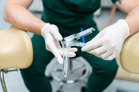 Close up view of professional doctor. Male gyno specialist examining.