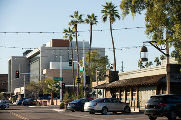 Late afternoon view of a light post framing the historic Old Town of Scottsdale, Arizona, USA.