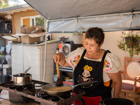 Woman preparing Indigenous foods 