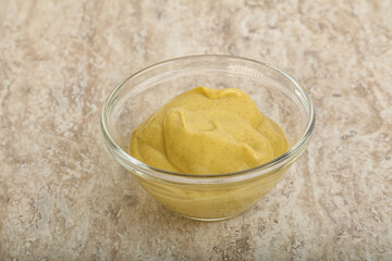 Organic mustard sauce in the bowl