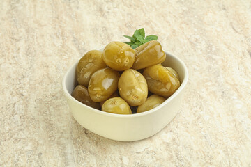 Pickled green tomato in the bowl