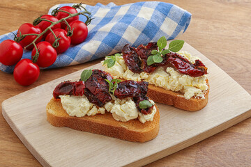 Bruschetta with soft cheese and tomato