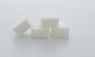 Group of sugar cubes on white background