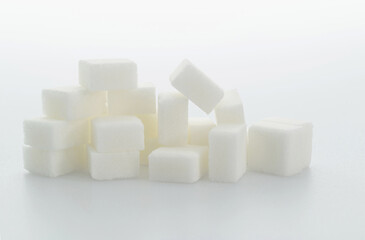 Group of sugar cubes on white background
