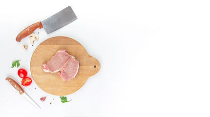 Raw juicy meat with garlic, tomato, spice, pepper, champignon, knife. Concept of food preparation
