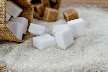 Sugar cubes on top of granulated sugar