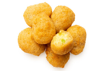 Pile of fried breaded chilli cheese nuggets isolated on white from above. One eaten.