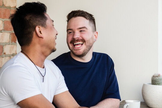 gay men laughing